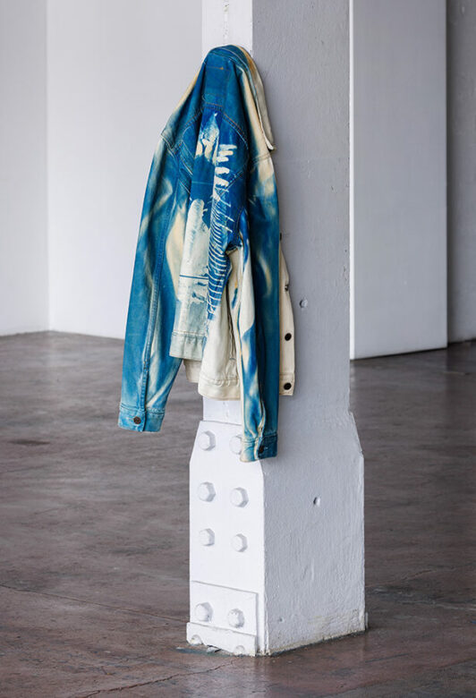 Roy K&Ouml;HNKE, Black Hole, RAM Jackets series, 2024 Veste en jean, javel, cyanotype. Frac-Artoth&egrave;que Nouvelle-Aquitaine, collection Frac Acquisition en 2025 Vue de l&rsquo;exposition Fleur, Feu, Le Cr&eacute;dac, Ivry, 2025. Commissariat Claire Le Restif. Photo : Salim Santa Lucia. &copy; Adagp, Paris 2026